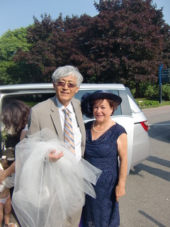 Michio & Lydia at Rachael's wedding Summer 2015.JPG